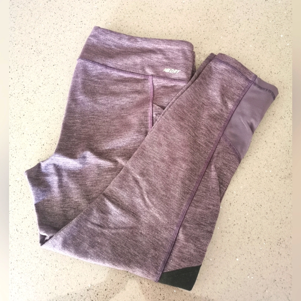 (3/$12) - New Balance Women Leggings. Size Medium. Black and Purple. 3/4 length.